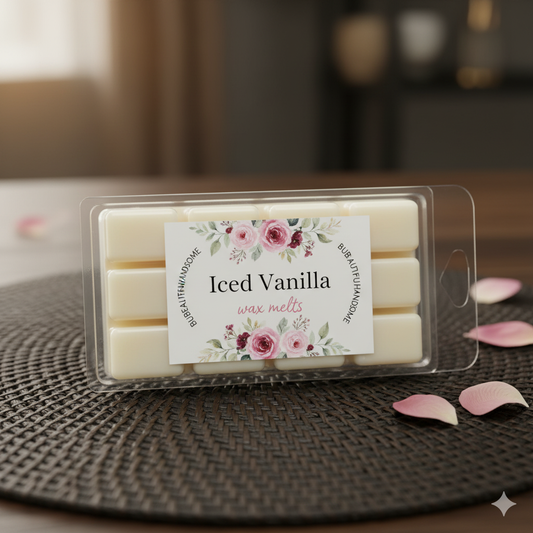 Packaged Iced Vanilla wax melts with a floral label on a textured surface.